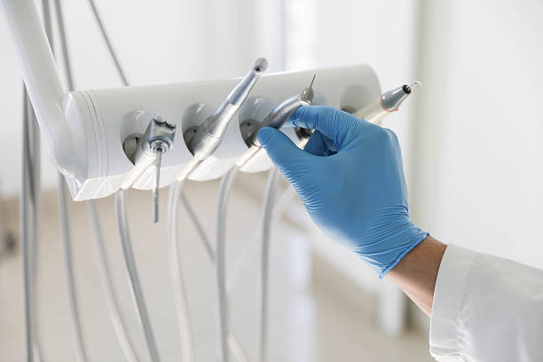Professional Tooth Extraction technician working in New Lenox, IL